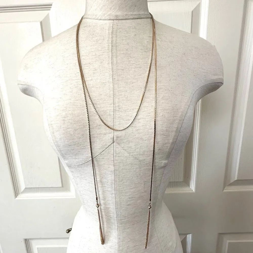 Charming Charlie gold tone long tassel chain necklace